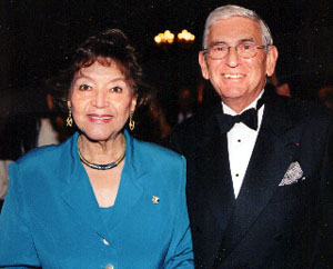 "Liliana Wilkerson, Founder and president of And Here's Lilly Event Management with the Chairman of SunAmerica Mr. Eli Broad"